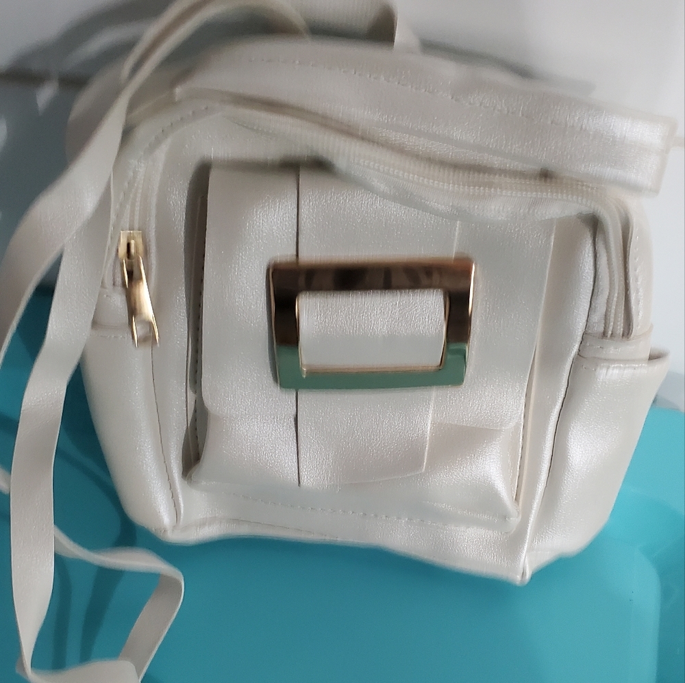 Elegant White Backpack with Gold Accents